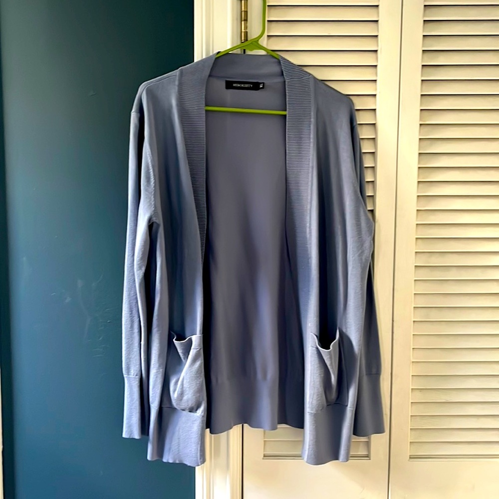 Blue-grey open draped cardigan with pockets.